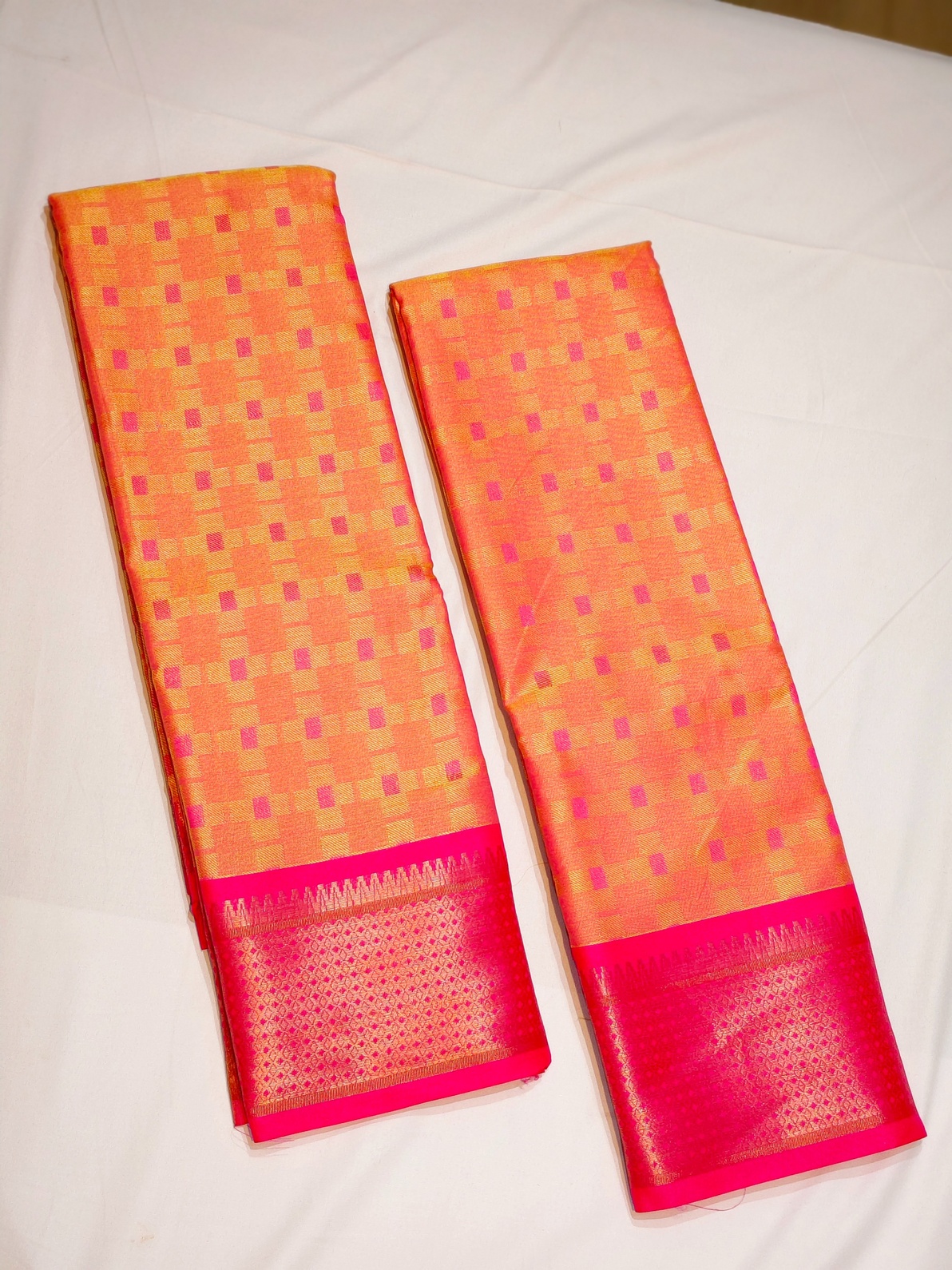 radiant peach-orange body Soft cotton rich thread woven checked design saree & Golden zari rani pink border