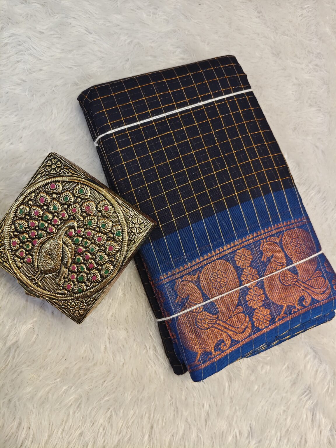 Black golden zari checked body with rich golden zari contrast border, striped pallu